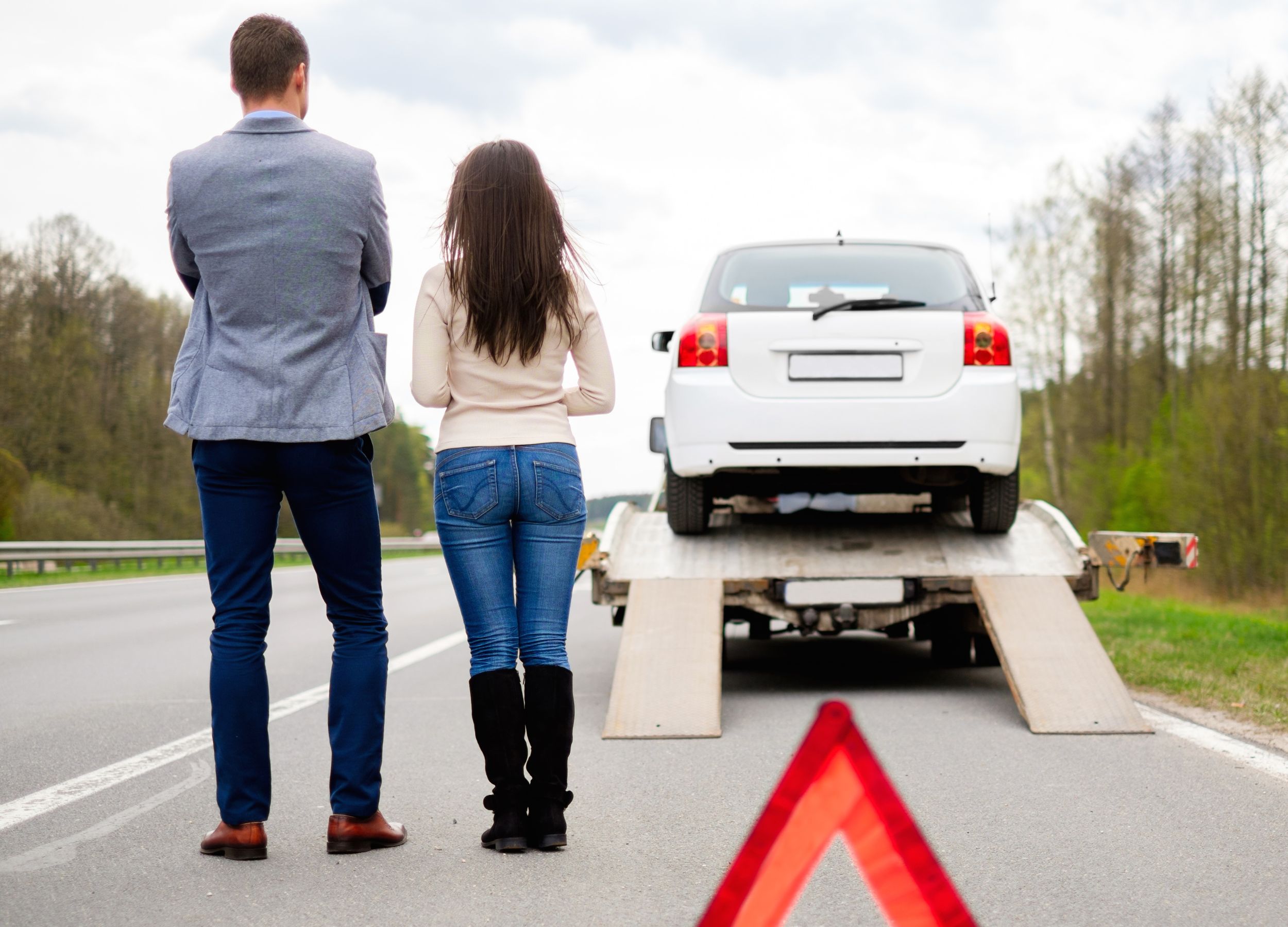 car recovery london breakdown car being loaded on platform