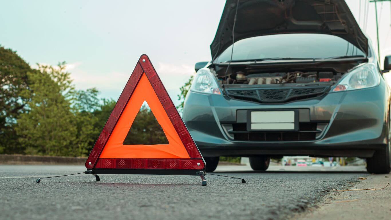 car breakdown with triangle sign